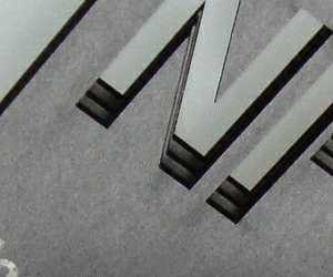 Noel Pelavin's Typopgraphy Laser Cut Business Card